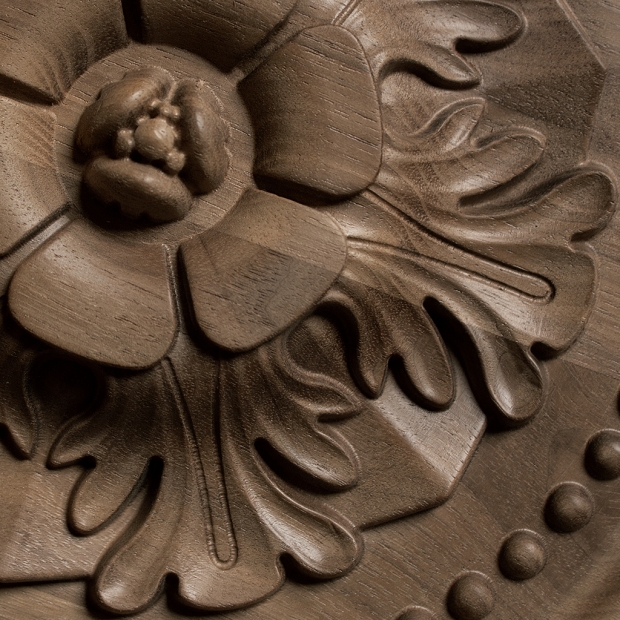 Wooden panel rosette for ceiling and cabinet panels projects, custom cabinetry and millwork.